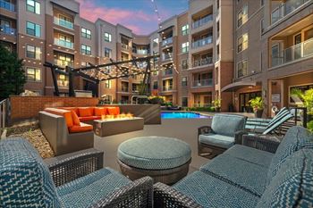 Poolside Lounge With Fireplace at 46 Penn Apartment Homes, Kansas City